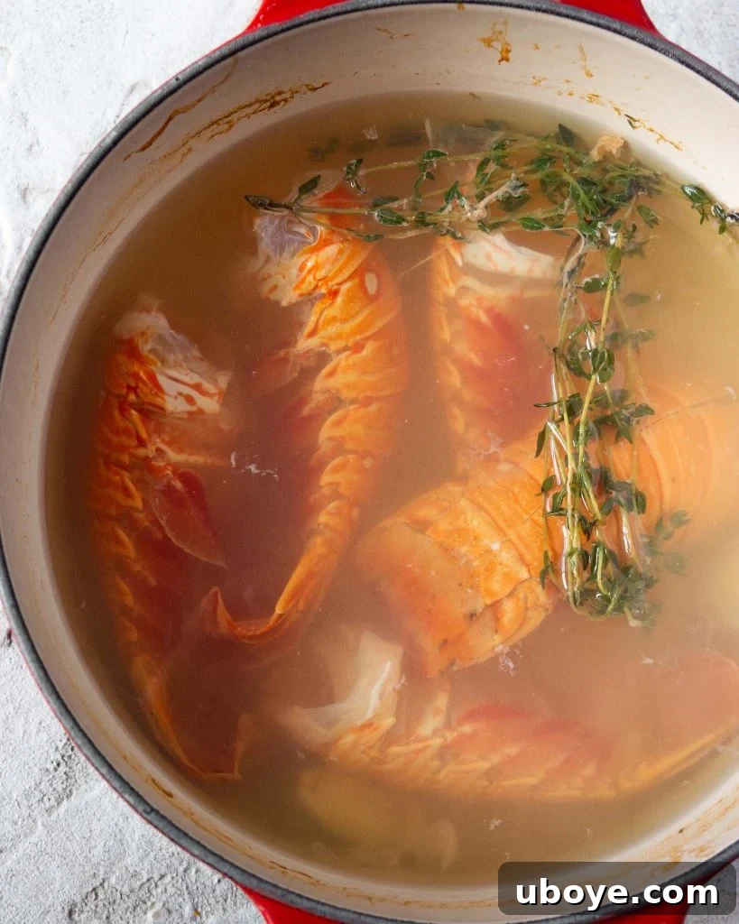 Close-up of fresh lobster tails, key ingredient for making bisque.