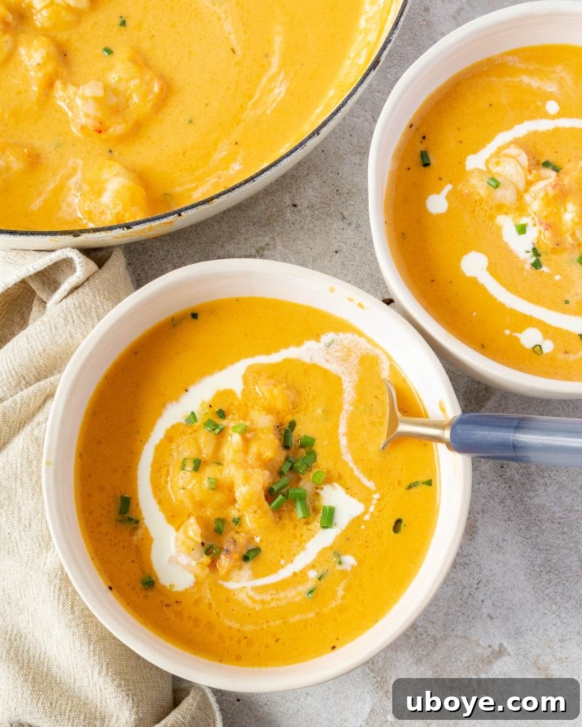 Lobster shells simmering in a pot to create a flavorful stock.