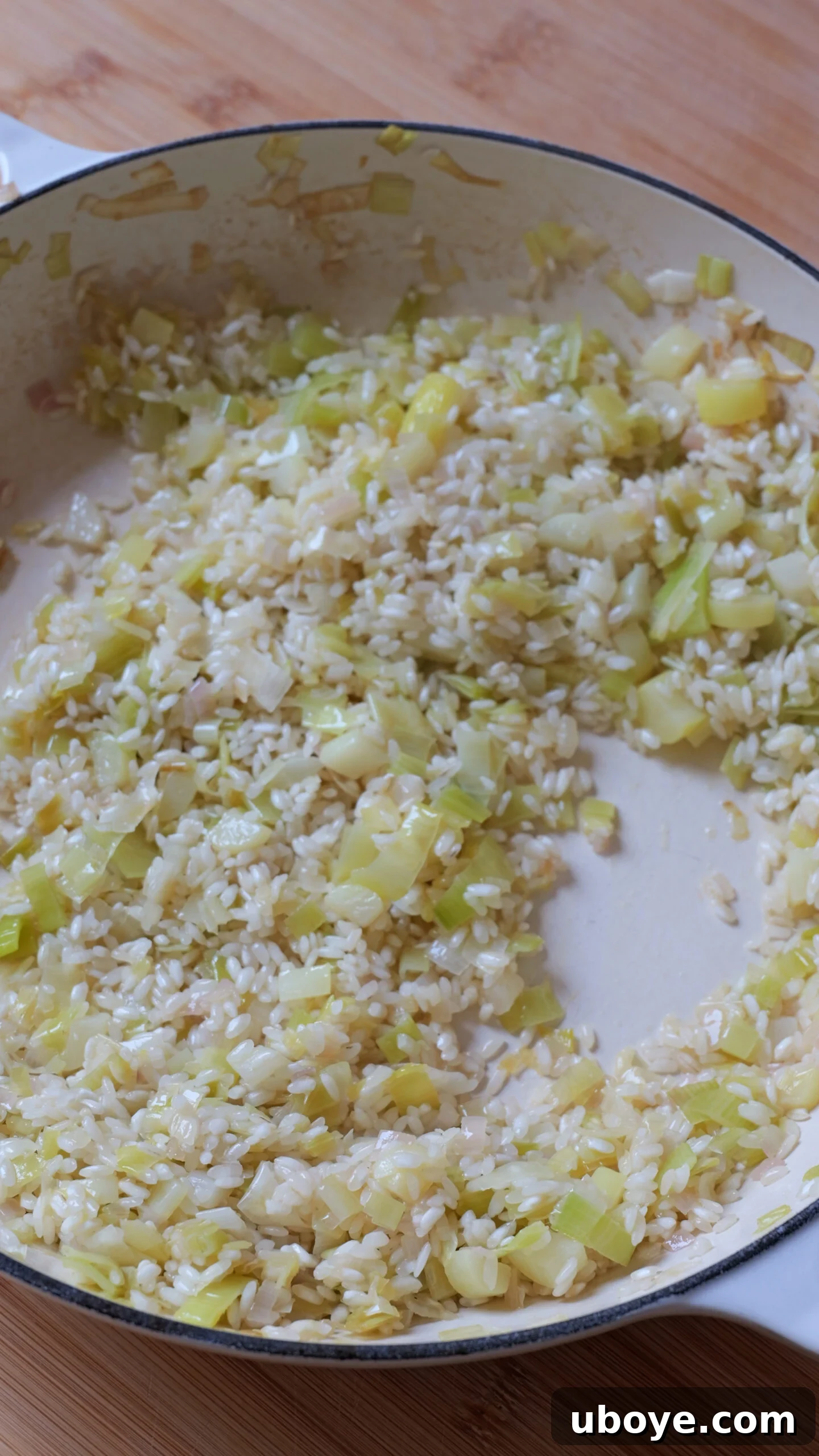 Creamy Leek Risotto 4 Arborio rice is added to the pan with the sautéed leeks, shallots, and garlic, toasting until opaque.