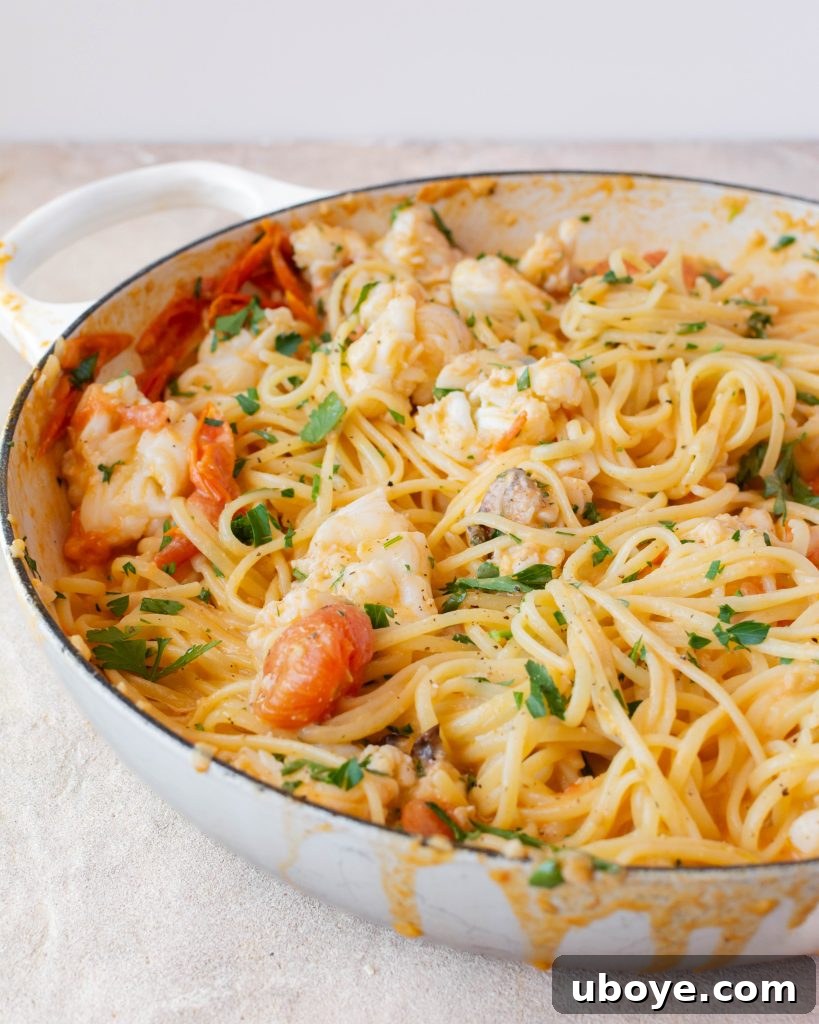 Velvet Lobster Pasta 10 An inviting overhead shot of the creamy lobster pasta, showcasing its rich texture and vibrant colors.