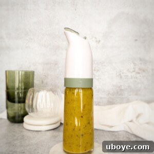 Close-up of One Minute Champagne Vinaigrette in a glass bottle