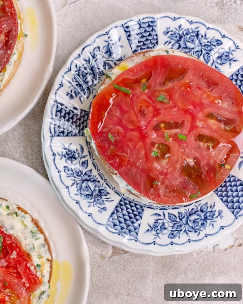 Bagel with Cream Cheese Perfection 9 A vibrant heirloom tomato slice ready for the bagel