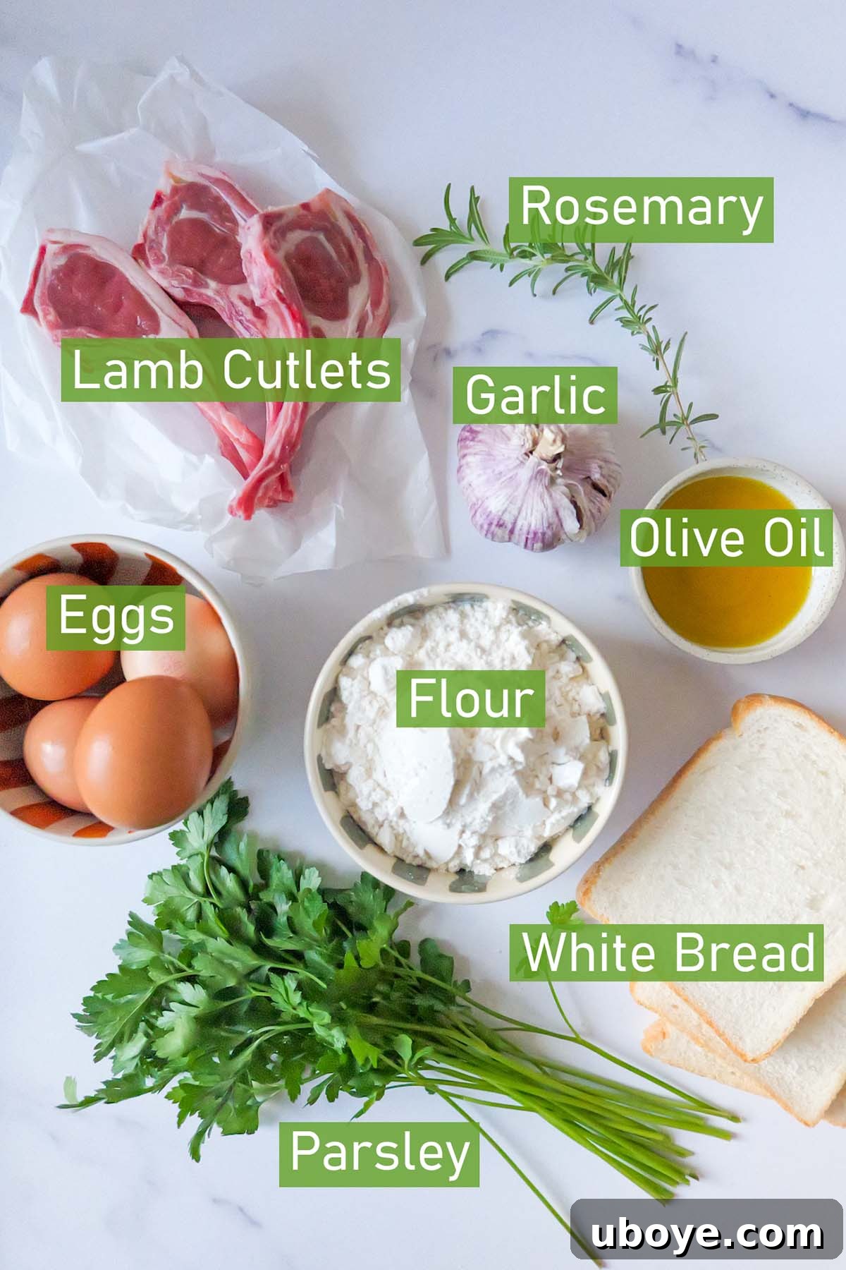 A flat lay photograph showcasing the simple, fresh ingredients required for making crumbed lamb cutlets.