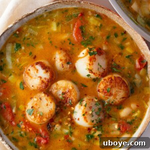 Lemony brothy beans with scallops