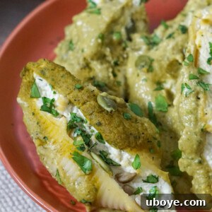 Finished Pumpkin Poblano Stuffed Shells in a pan, ready to serve
