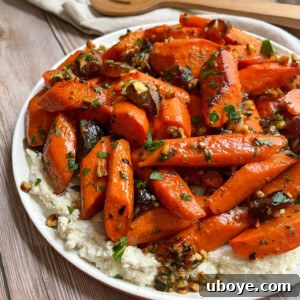 A top-down view of the prepared Maple Roasted Carrots dish, ready to serve.