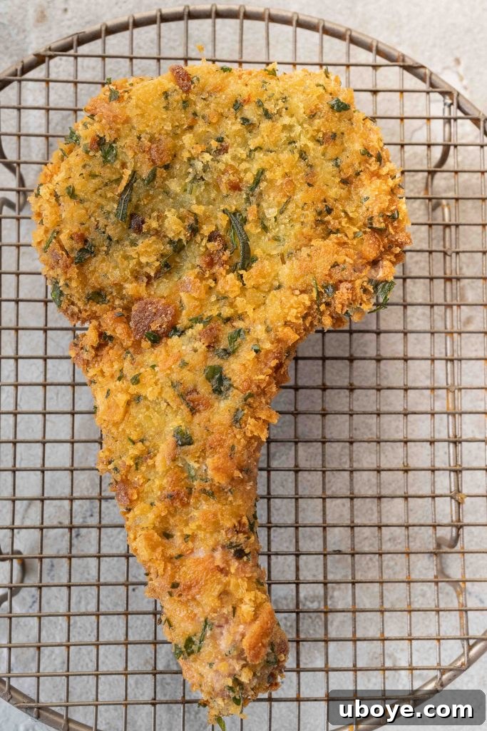 Golden Crusted Pork Cutlets 11 Plated crumbed pork cutlets with lemon