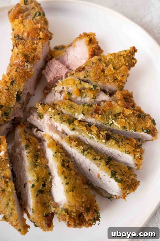 Golden Crusted Pork Cutlets 10 Checking temperature of pork cutlet with thermometer