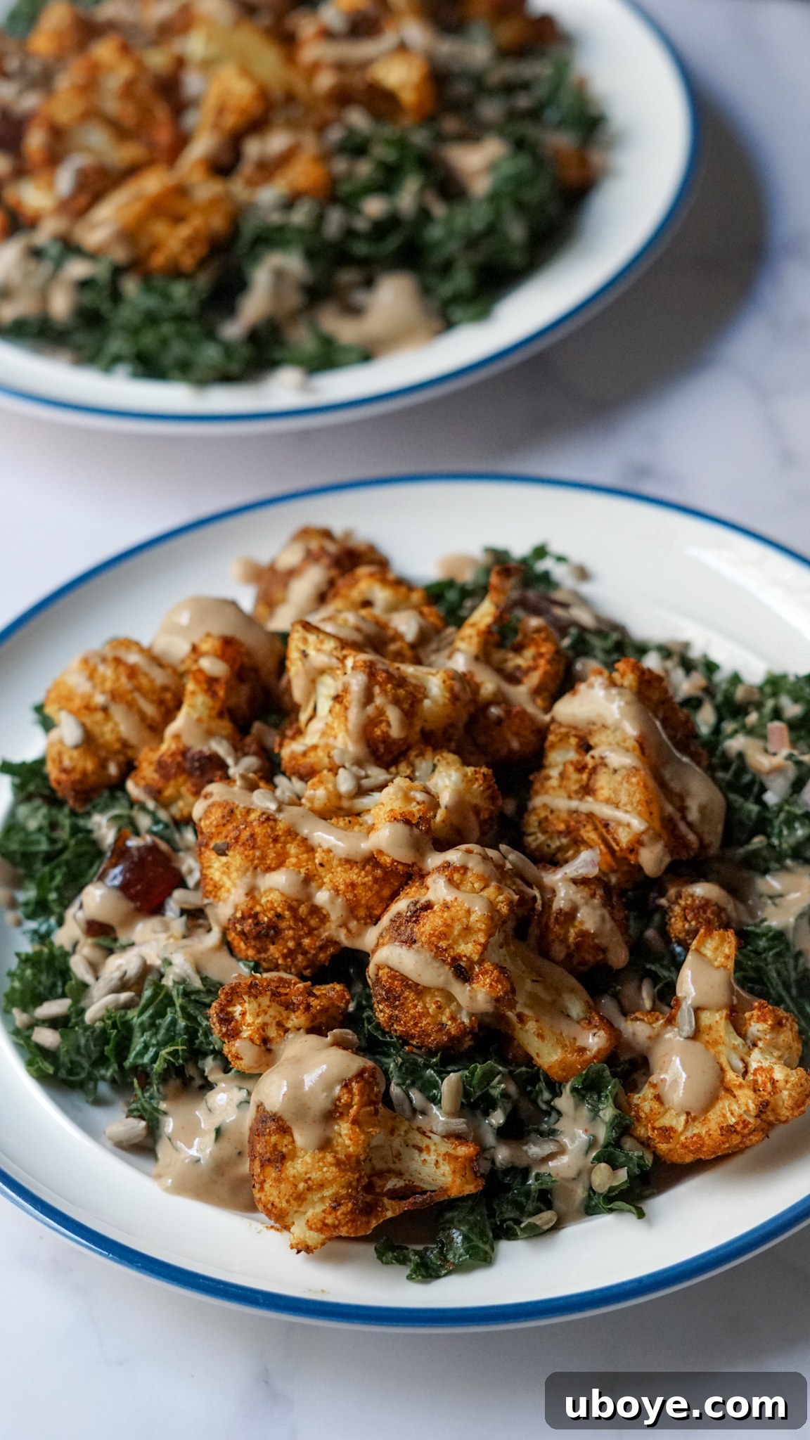 Overhead shot of Shawarma Spiced Cauliflower and Kale Salad in a bowl