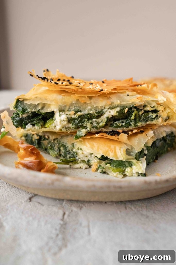 Crispy golden Spanakopita, a delicious Greek spinach pie