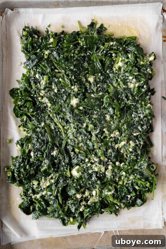 Close-up of the delicious Spanakopita filling with spinach and feta