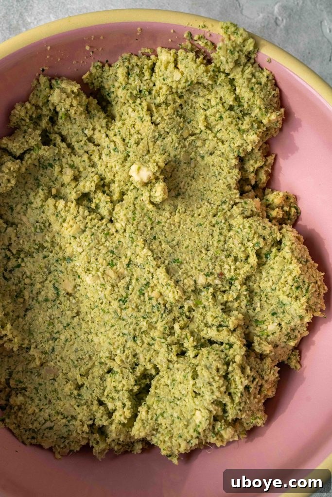 A close-up of the falafel mixture in a food processor.