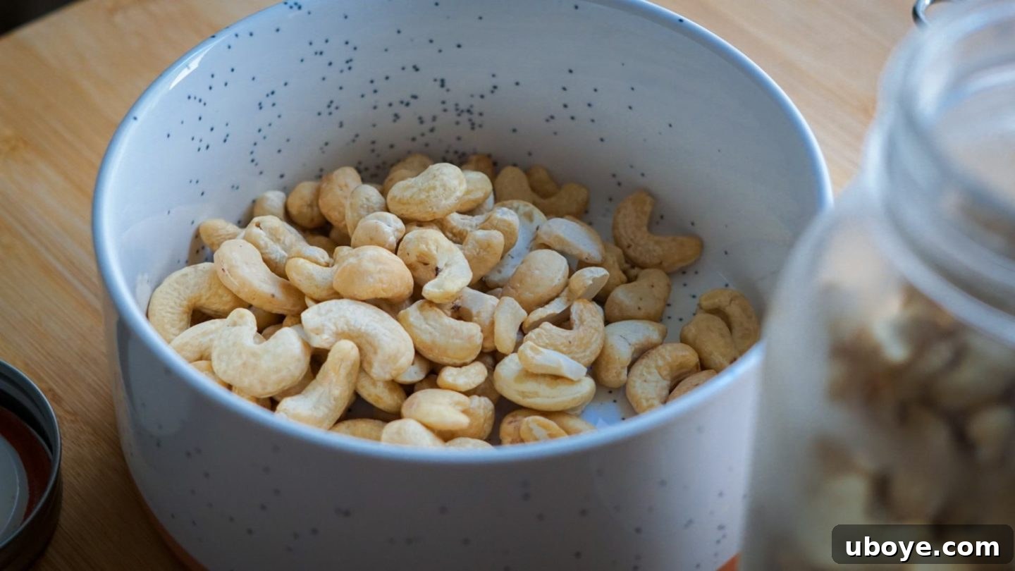 Velvety Plant-Based Queso 6 A bowl of raw cashews, soaking in water, ready for blending into the creamy dip.