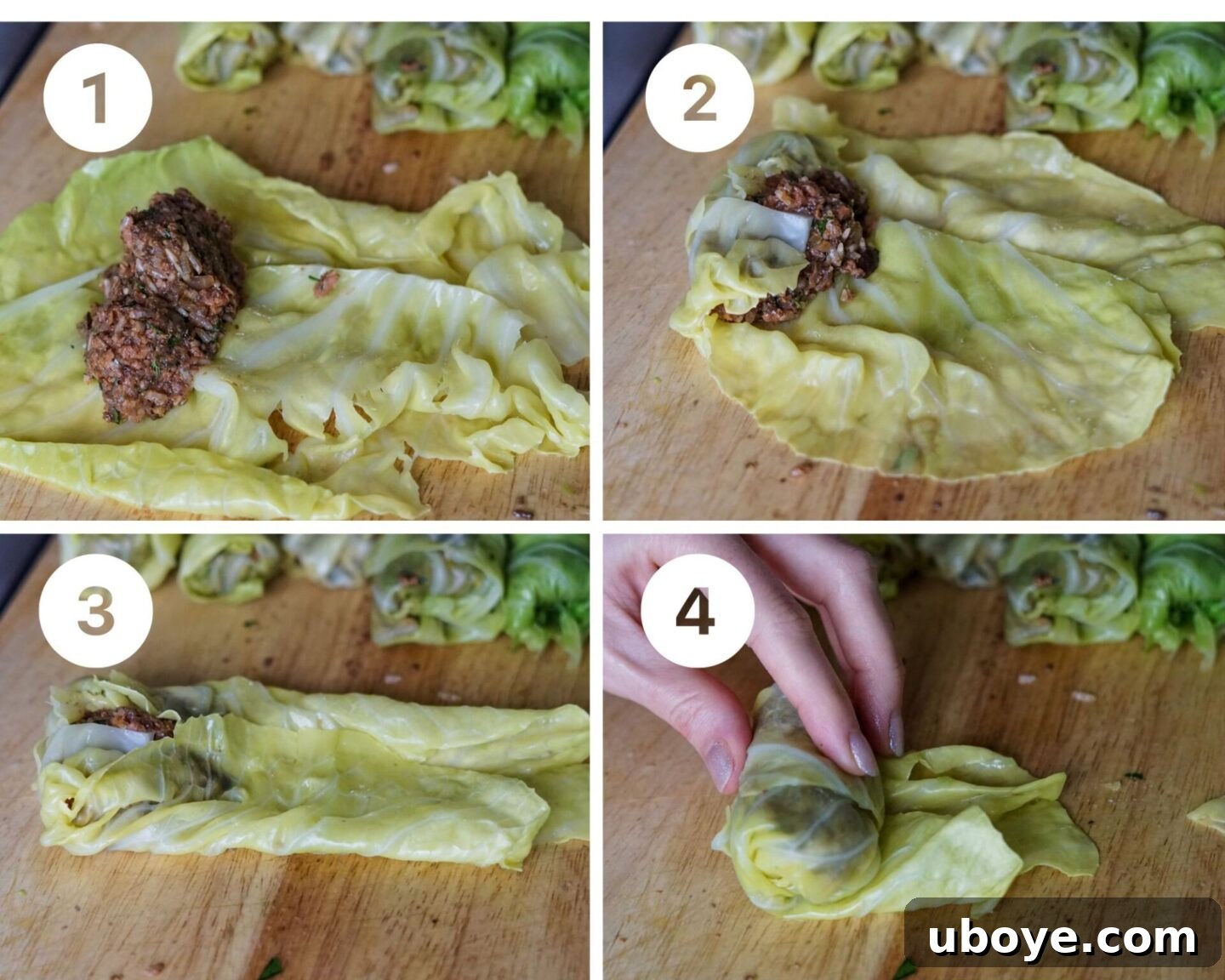 Hearty Plant-Based Cabbage Rolls 8 Hand demonstrating the technique of rolling a vegan cabbage roll with the filling inside.