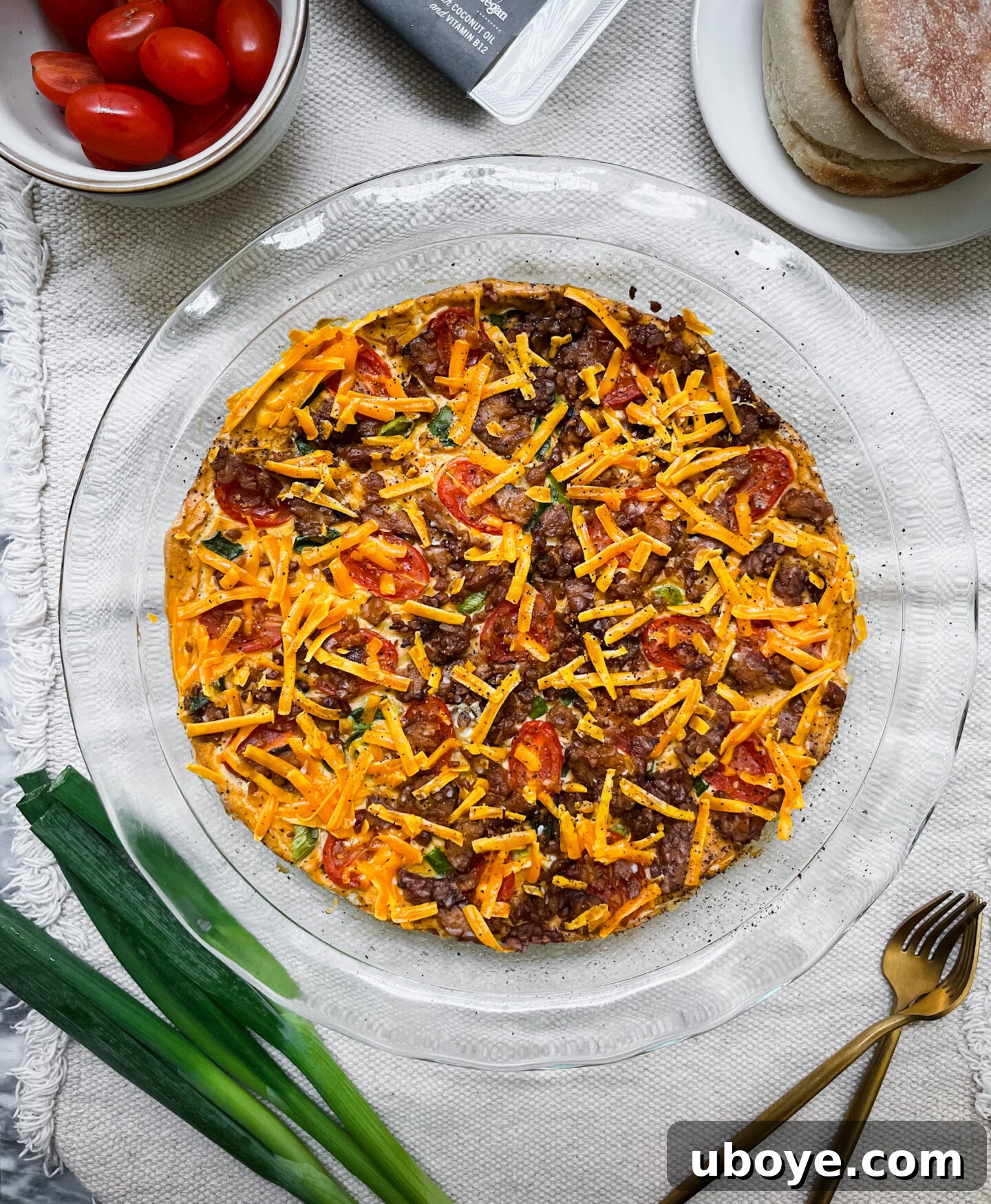Sliced vegan frittata ready to be assembled into breakfast sandwiches.