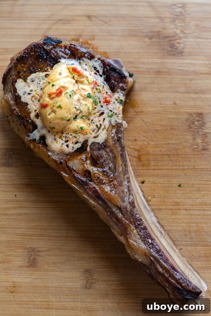 Reverse seared ribeye, sizzling on the grill