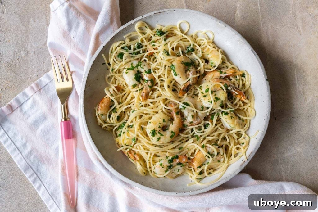 Garlic butter prawn pasta - a close-up of the finished dish with fresh parsley