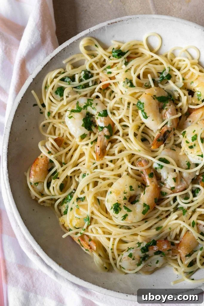 A final serving of garlic butter prawn pasta, meticulously garnished and ready to enjoy