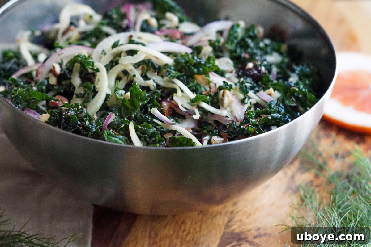 A generous bunch of fresh kale leaves on a wooden cutting board