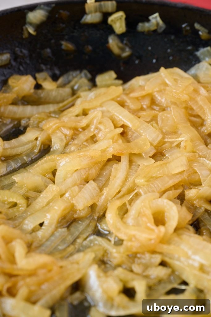 Heavenly Brie Potato Gratin 8 Caramelized onions in a pan