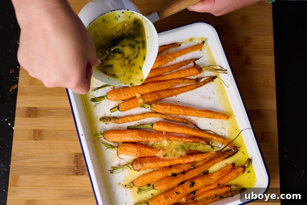 Garlic being poured into carrots