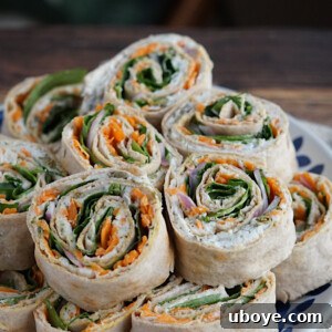 Effortless Pinwheel Creations 7 A vibrant display of freshly prepared vegan pinwheels, ready to serve as an appetizer or light meal