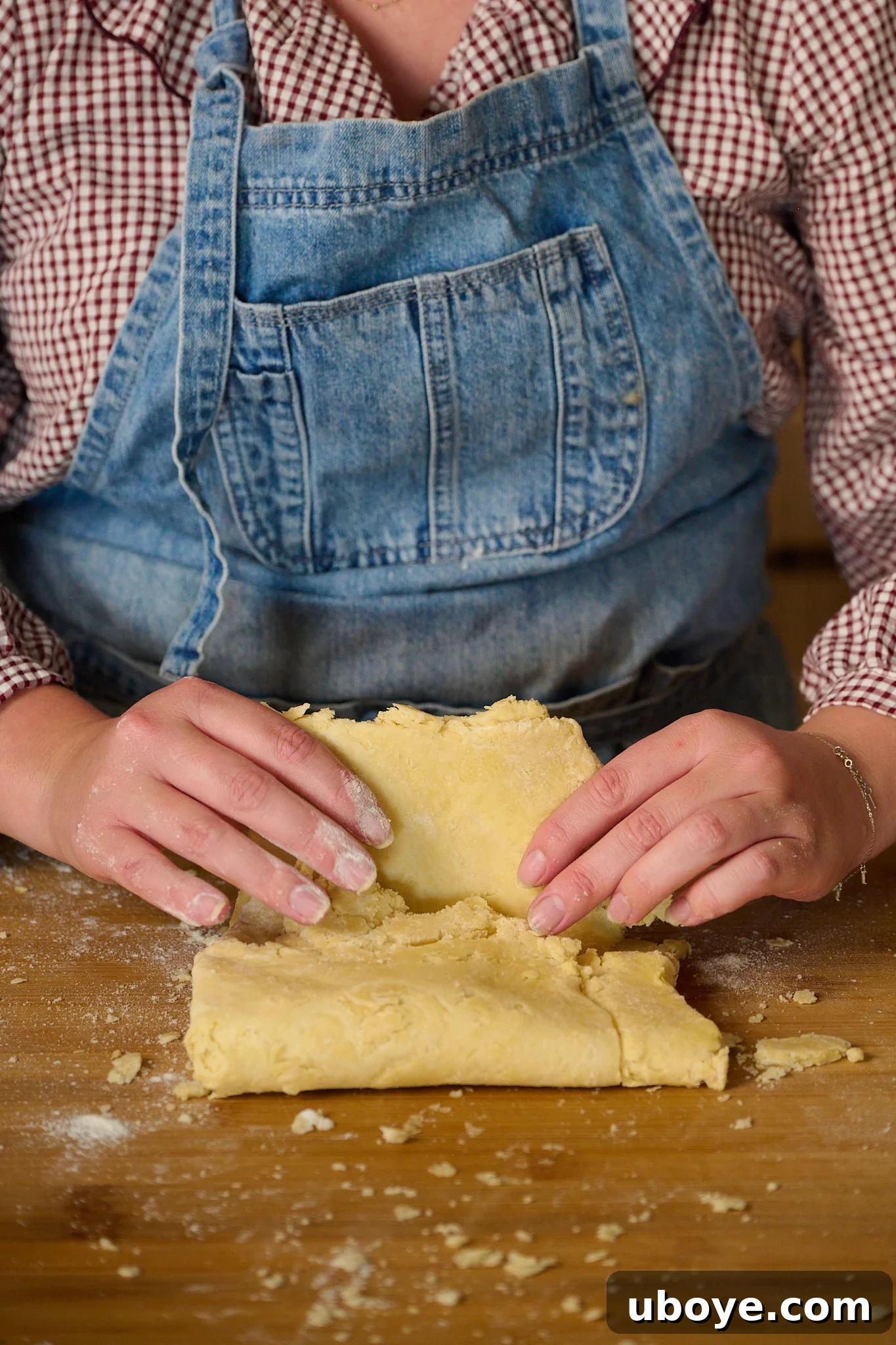Hearty Chicken, Mushroom and Bacon Pot Pie 7 puff pastry is being folded