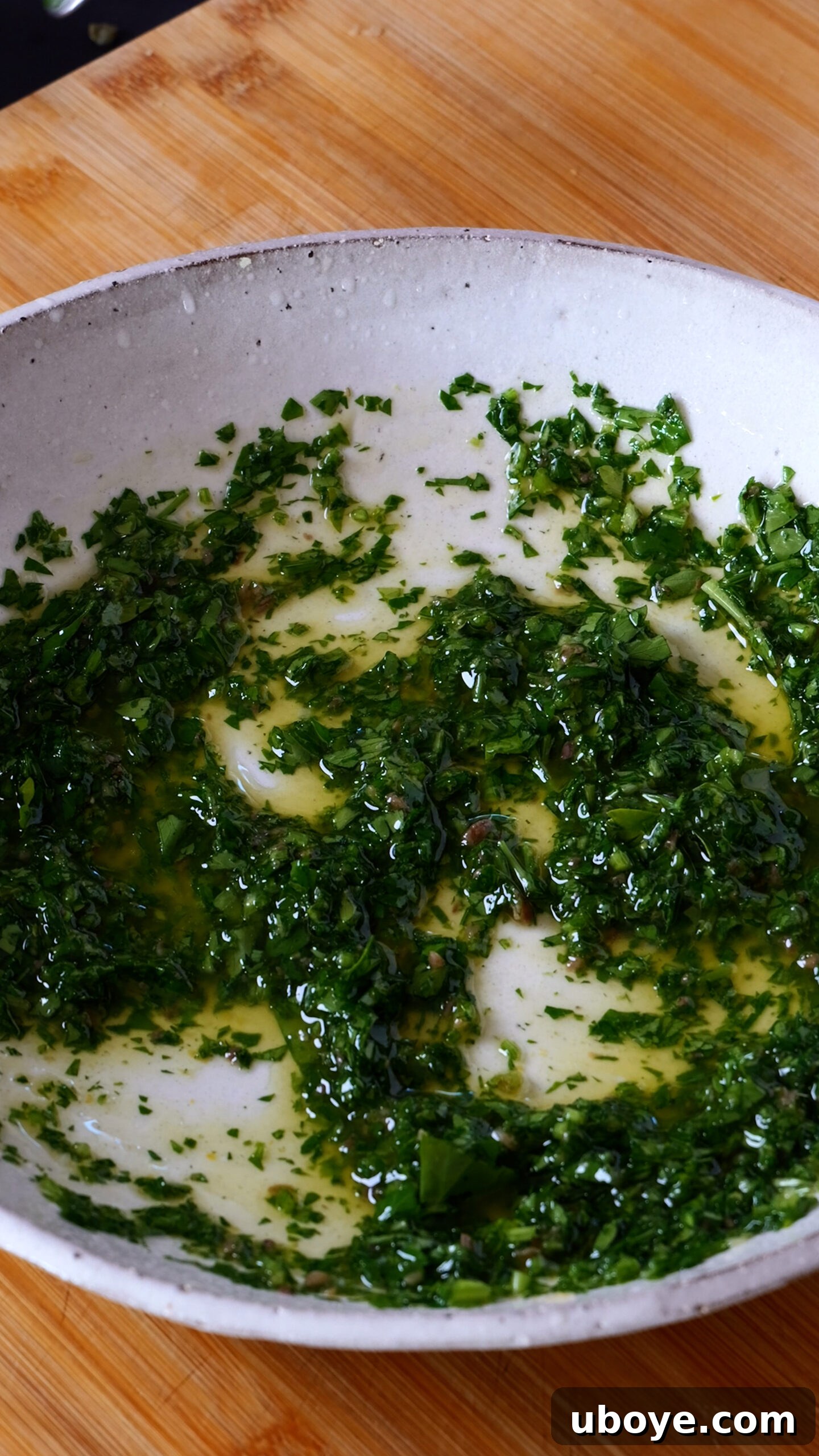 Italian-Style Potato Salad (Mayo & Dairy-Free Recipe) 5 Dressing for Italian Potato Salad in large white bowl.